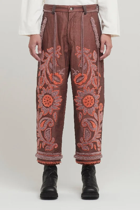 Multi-pocket pants for organized travel convenience -Craig Green Tapestry Trousers